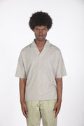 Polo con taschino beige
