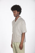 Polo con taschino beige
