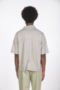 Polo con taschino beige